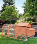 96.5-Inch Wooden Chicken Coop With Portable Wheels, Hen House And Nesting Box in a backyard with large run and trees