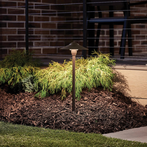8 Inch Outdoor LED Path Light In Textured Architectural Bronze With 12V Adjustable Exterior Dome Light illuminating garden