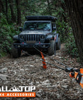 Heavy Duty 9/16 Inch 76 Foot Synthetic Winch Rope Kit With Hook Isolator Forged Hook Rubber Stopper And Safety Pull Strap 35000 Lbs Break Strength UHMWPE Recovery Cable For Off Road in use pulling SUV in forest terrain