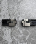 Kickass Pitch Conversion Fiber Holders Paired With Slick Sheath Clamps For Fast Glueless Ribbonizing Of 200 Micron Loose Optical Fibers S017464 FH7012PC Left Right Coded Jigs on a gray surface.