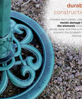 Close-up of the base of a 35 Inch Outdoor Pedestal Water Fountain With 3 Tier Cascade, Durable Resin Birdbath For Garden Patio Deck.