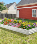 Galvanized Raised Garden Beds 2 Pack Metal Garden Kit 4x8x1 Feet in use, filled with colorful flowers in backyard setting.