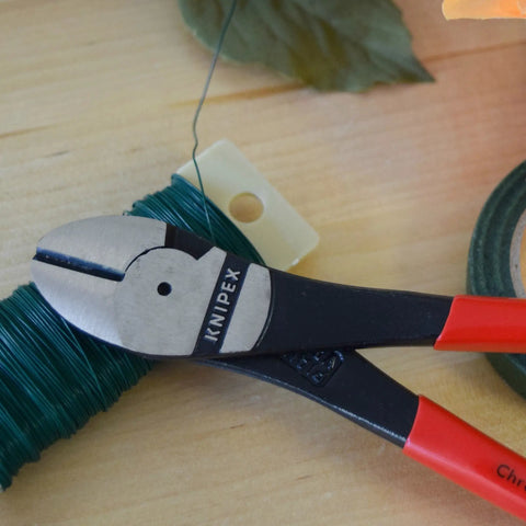 Heavy Duty High Leverage Diagonal Cutters With Boss Level Power for Cutting Wire and Piano Wire on wooden surface