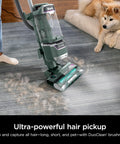 Detect Pro Lift Away ADV Bagless Upright Vacuum cleaning pet hair on carpet with DuoClean Detect and HEPA Filter in use.