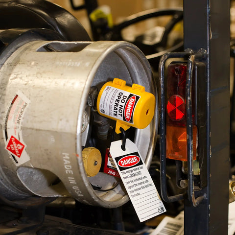 Lockout Tagout Sleeve For Forklift Propane Tank Hand Wheel Cover With Recycled Polycarbonate Shell installed on a tank
