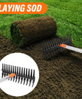 Heavy Duty Metal Thatch Rake For Lawn Care 15 Inch Wide Dethatcher With Sturdy Handle shown laying sod in garden