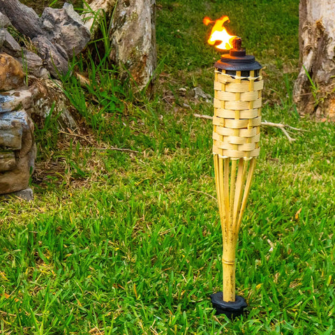 Heavy Duty Ground Stakes Torch Stand For Outdoor Tiki Torches on grass, showing freestanding spike base installation.