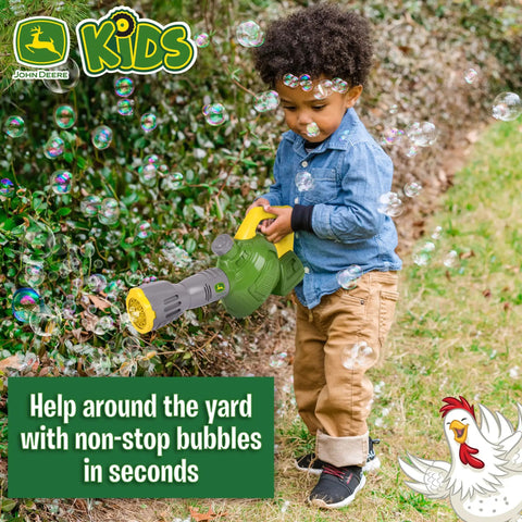 Child playing with Bubble Leaf Blower Toy For Kids With 24oz Bubble Refill, Battery Operated Outdoor Bubble Machine in garden