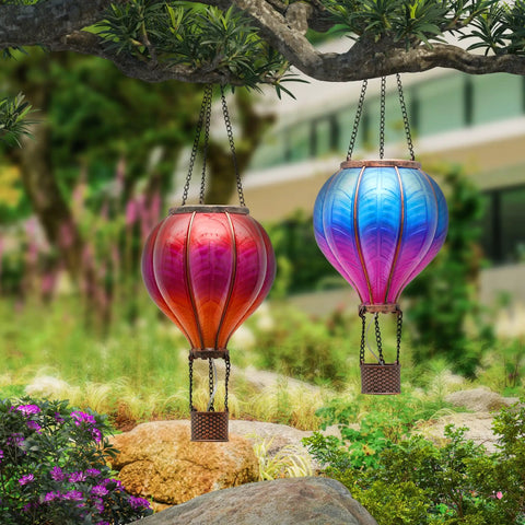 Set Of 2 Dope Hot Air Balloon Solar Lanterns For Outdoor Garden Decor in red and blue hanging from tree, 18 inch size