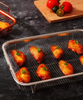 Nonstick Mesh Air Fryer Basket Set For Oven with grilled wings, stainless steel rack, 360 degree air circulation for even browning