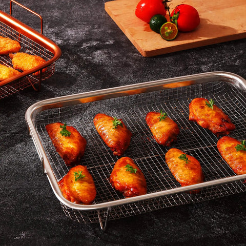 Nonstick Mesh Air Fryer Basket Set For Oven with grilled wings, stainless steel rack, 360 degree air circulation for even browning