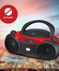 Portable Top-Loading CD Boombox With AM/FM Radio And 3.5mm Line In For MP3 Players, Red And Black, displayed outdoors.