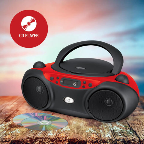Portable Top-Loading CD Boombox With AM/FM Radio And 3.5mm Line In For MP3 Players, Red And Black, displayed outdoors.