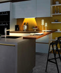 Kitchen with Two Pack Rechargeable Wireless LED Closet Lights With Motion Sensor illuminating under counter