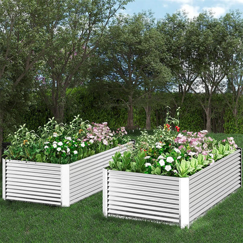 Three Piece Tall Galvanized Raised Garden Bed Set For Outdoor Vegetable And Flower Gardening Built To Last Heavy Duty Steel Raised Bed Box Above Ground Weatherproof Durable Wavy Design Four By Two Feet shown with plants.