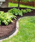 Curved installation of 40 Ft No Dig Landscape Edging Kit With 60 Spikes 2 Inch High Heavy Duty Plastic Lawn Border for flower beds