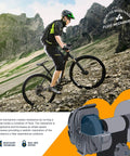 Cyclist on mountain with Portable Foldable Fluid Bike Trainer Stand For Indoor Riding With Stainless Steel Frame Near Silent Flywheel