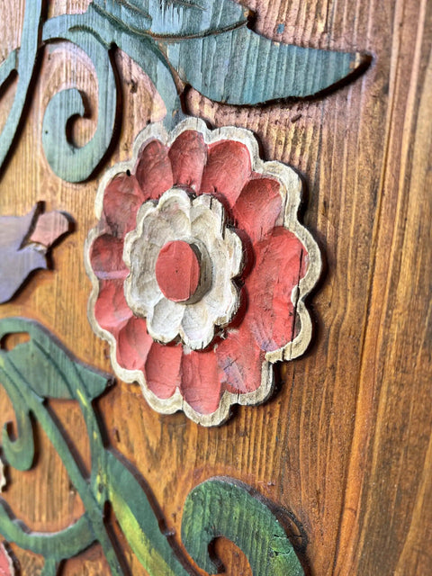 Close-up of Handcrafted Wooden Sliding Barn Door With Peacock And Floral Design For Rustic Farmhouse Cabin Decor, hand-painted flower