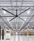 Heavy Duty 288 Inch HVLS Industrial Ceiling Fan Featuring Six Aluminum Blades and a Ripping 459000 CFM quiet DC motor in a warehouse setting.