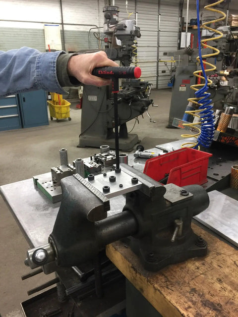 Person using Power-T Handle Ball-Hex Key Allen Wrench Set in a workshop on machinery equipment