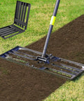 Foldable Lawn Leveling Rake With 30x10 Inch Ground Plate And 70 Inch Adjustable Handle on grass for soil leveling