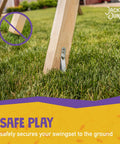 Wooden swing set leg secured with Playset Anchor Kit for Swing Sets Heavy Duty Ground Anchors in grassy backyard.
