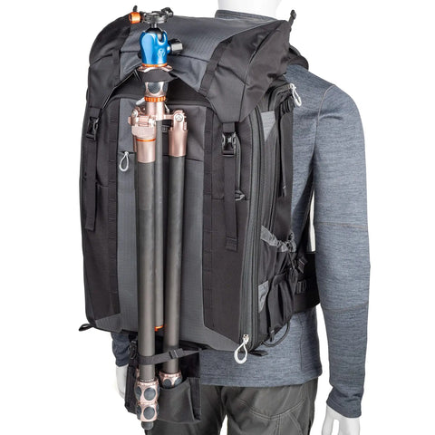 Mannequin wearing 46L Camera Backpack For Travel Photography With Expandable Front Pocket For A 16 Inch Laptop And Gear Adjustable Foam Dividers.