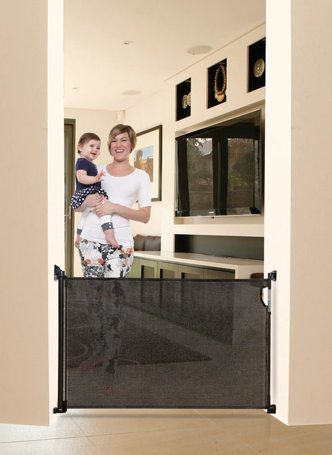 Indoor Outdoor Retractable Mesh Baby Gate With Dual Hardware For Easy Relocation Expands Up To 55 Inches Wide And Stands 33 Inches Tall Ideal For Doorways And Stairs Weather Resistant UV Treated Mesh Black