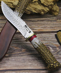 Damascus Steel Hunting Knife With Faux Antler Handle, 5.4 Inch Fixed Blade Skinner, hand forged wave pattern, wooden sheath shown