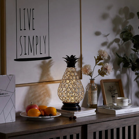Extra Large Crystal Pineapple Lantern Lamp With IP44 Waterproof 13 Inch on wooden table with books, fruit, and flowers