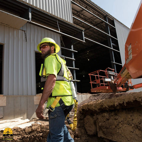 Worker wearing Heavy Duty Fall Protection Kit With 3D THUNDER Full Body Harness, 6 Ft Lanyard, at construction site