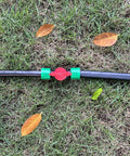 Irrigation In Line Barbed Shut Off Valve With Locking Fitting For Half Inch Drip Tape Tubing on grass with leaves