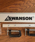 Front view of Swanson CG100 aluminum 100-inch cutting guide with joiner bar; includes 2 C-clamps and 4 thumb screws