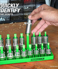 Person organizing sockets in a Six Tray Socket Organizer For SAE And Metric Sockets Fits One Quarter, Three Eighths, And One Half Inch Drives.