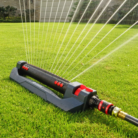 Turbo Oscillating Sprinkler With 18 Precision Nozzles Covers Up To 4400 Sq Ft No Fuss Quick Connect Bundle on a green lawn