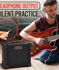 Compact 10 Watt Electric Guitar Amp With 5 Inch High Definition Speaker Easy Volume Bass Treble Distortion And Gain Controls Headphone Output Perfect For Practice Jamming And Small Gigs next to man playing guitar