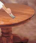Applying Clear SealCoat Universal Sanding Sealer For Interior Wood And Floors, Fast Drying, Sandable In Minutes on a wooden table