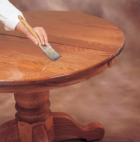 Applying Clear SealCoat Universal Sanding Sealer For Interior Wood And Floors, Fast Drying, Sandable In Minutes on a wooden table