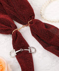 Two Piece Horse Bit Buckle Set Silk Scarf Buckle Ring in gold and silver on red scarf with pearl bracelet