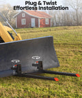 Beefy 43 Inch 2000 Lbs Heavy Duty Pallet Forks for loader bucket with adjustable stabilizer bar in field setup.