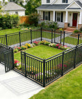 Installed Rustproof Metal Garden Fence Kit 36ft Long 40in High With 14 Panels And 2 Gates No Dig Pet Barrier in a yard.