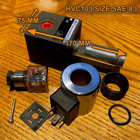 Front view of hydraulic solenoid diverter valve kit with black actuator block, silver piston rod, blue ring, O-rings.