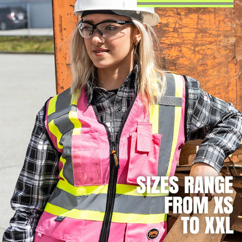 Woman wearing Women's Hi-Vis Safety Vest With Pockets Pink Reflective Tape For Construction And Outdoor Work