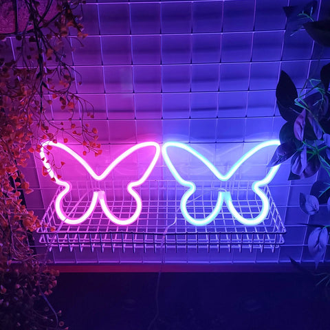 Butterfly Neon Sign LED Light USB Or 3 AA Battery Powered Pink Neon Lamp for table decor and bedroom wall accent with blue and pink glow.