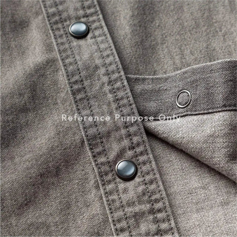 Close-up view of Pearl Snap Fasteners 20 Sets 10.5mm Cloudy White Pearl Popper Buttons on a grey fabric for Western shirts