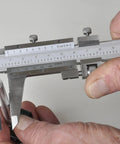 Vernier Caliper 0 To 6 Inch (0 To 150 Mm) Measuring Range Satin Chrome Stainless Steel in use for precision measurement