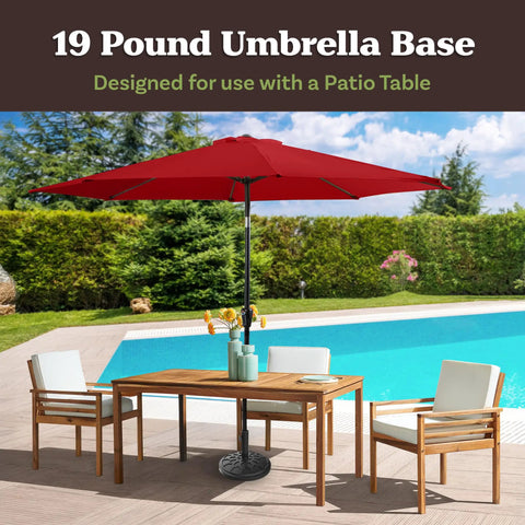 Heavy Duty 19 Pound Outdoor Umbrella Base Stand For Patio Tables And Tilt Freestanding Umbrellas, visible by poolside with red umbrella