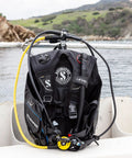 Super Cinch Front Adjustable Scuba Diving BCD With Balanced Power Inflator For Recreational Diving Small on boat near rocks