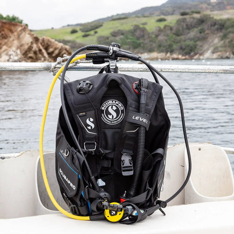 Super Cinch Front Adjustable Scuba Diving BCD With Balanced Power Inflator For Recreational Diving Small on boat near rocks