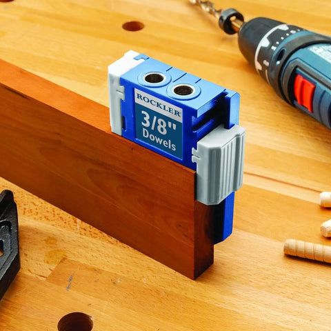3/8 Inch Doweling Jig Kit with Drill Bit and Stop Collar shown in use on wooden board, with dual edge stops for alignment